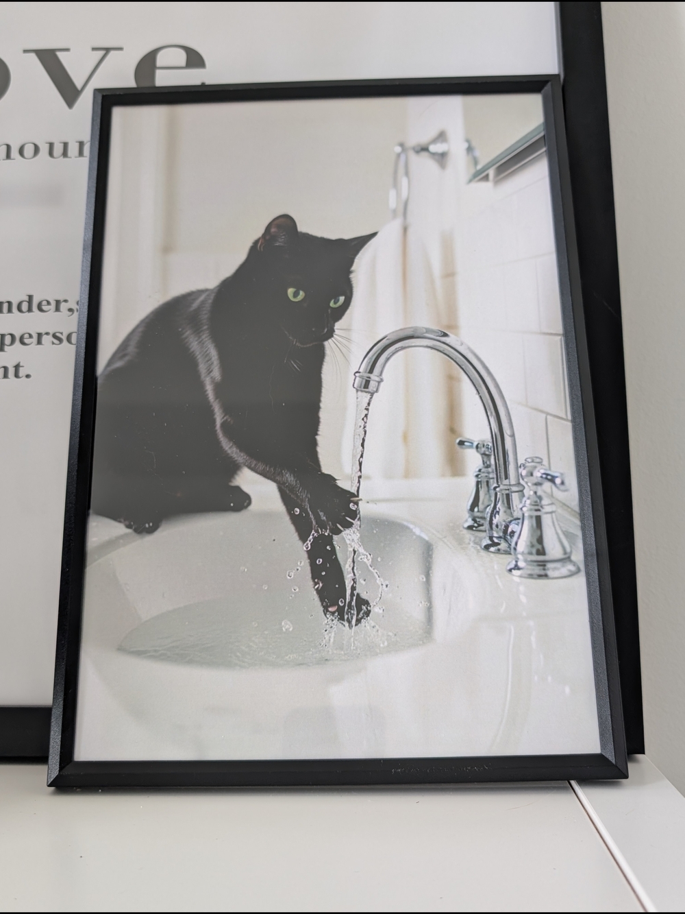 Black Cat Playing in Bathroom Sink Framed Art Print, 20x30cm